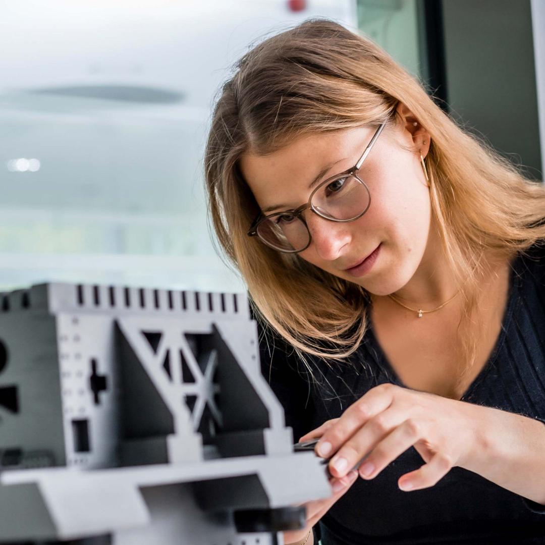 A scientist working on a prototype in the laboratory
