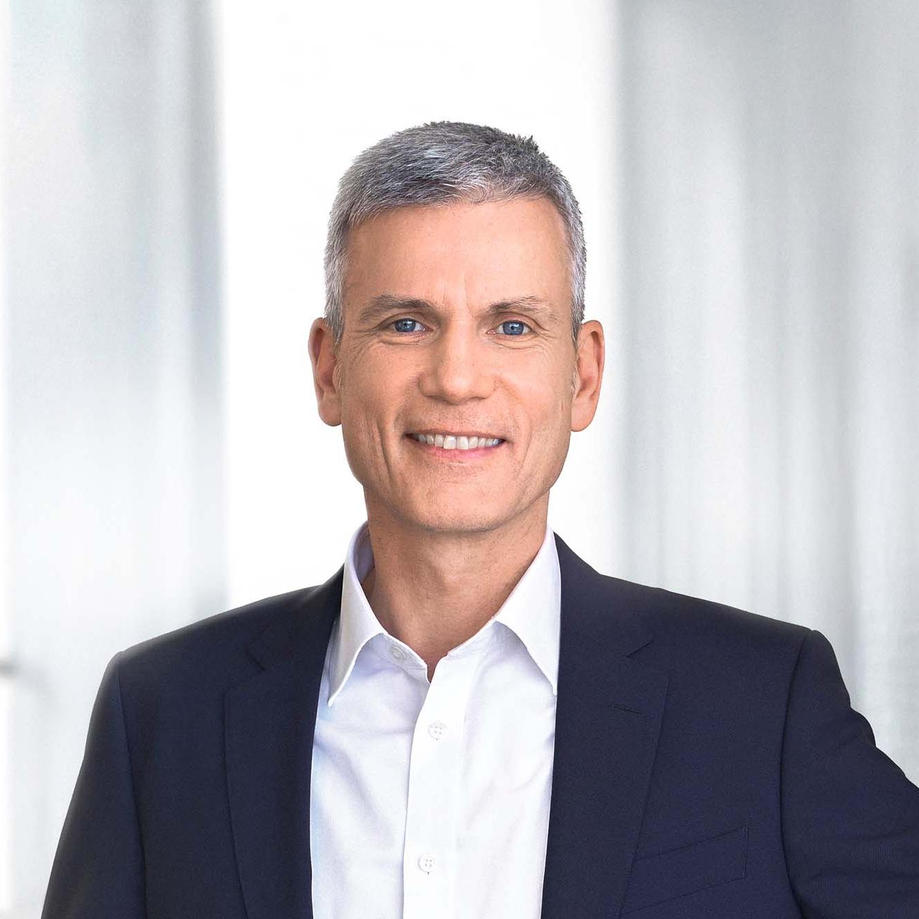 Portrait of Andreas Pecher, President and CEO of the ZEISS Group