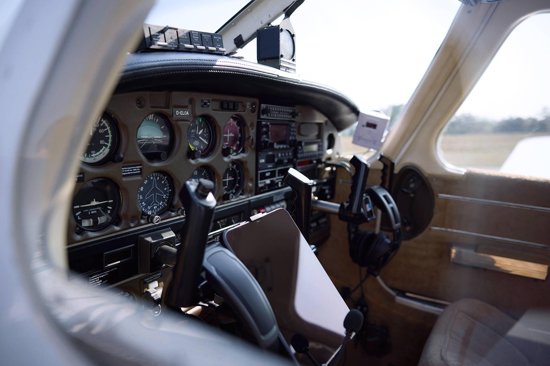 View of the inside of the cockpit of a small airplane