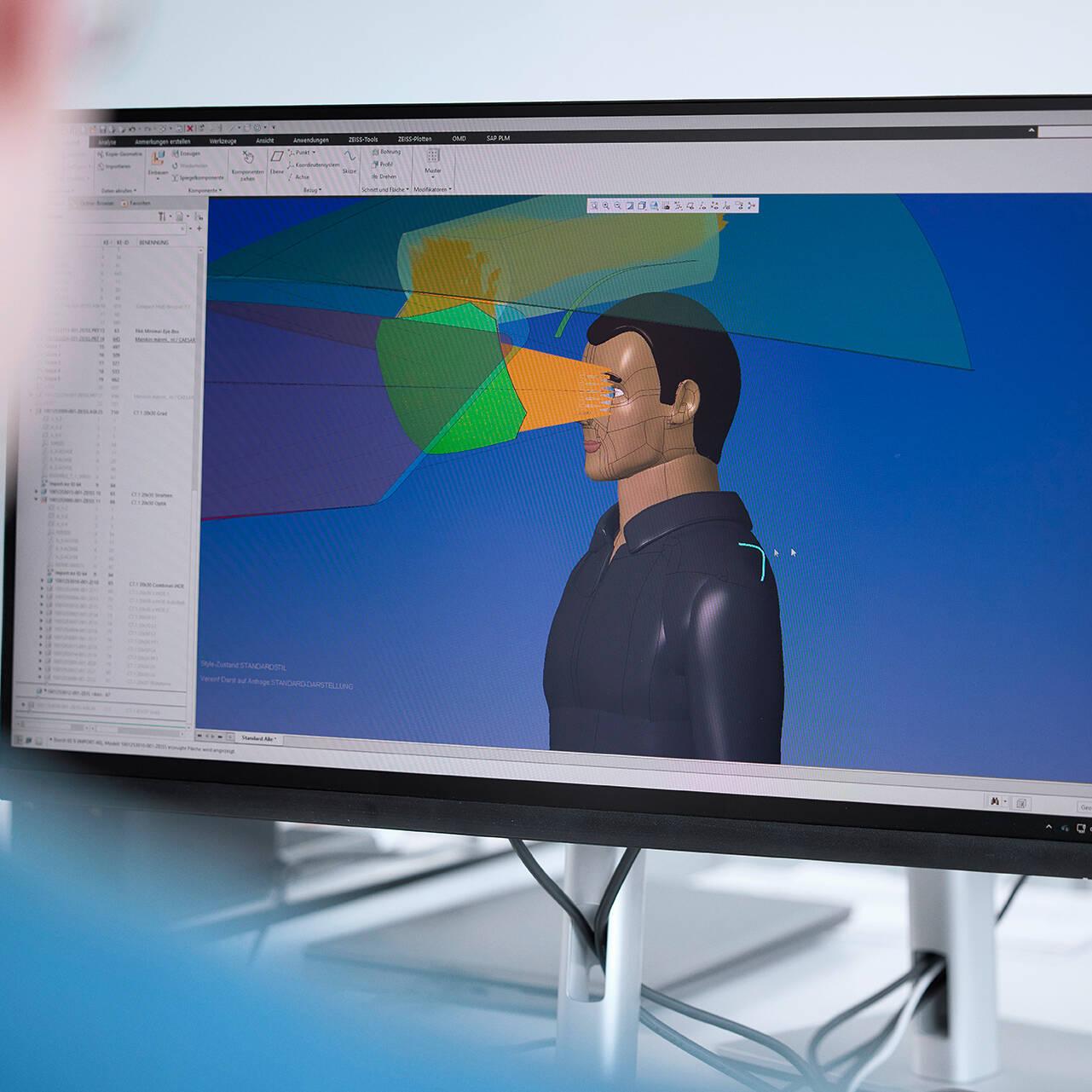 An animated person and their field of vision can be seen on a computer screen, highlighted in color.