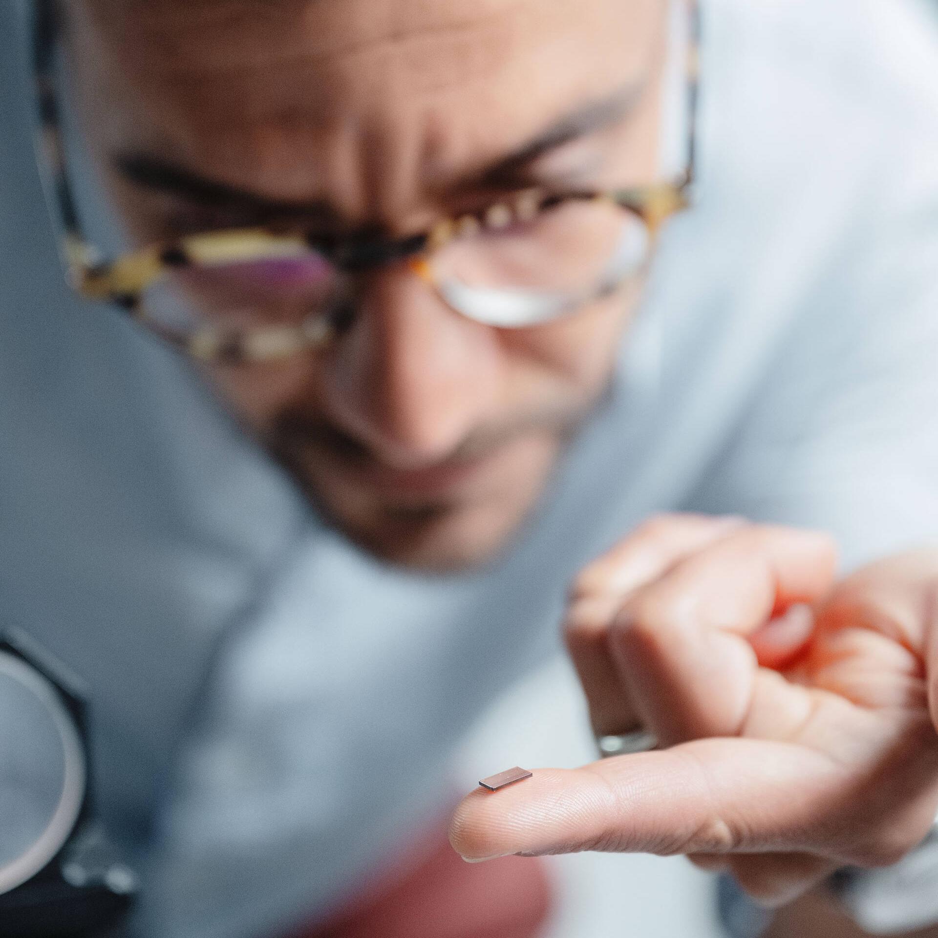 Davide Canavesi inspecting an optical sensor