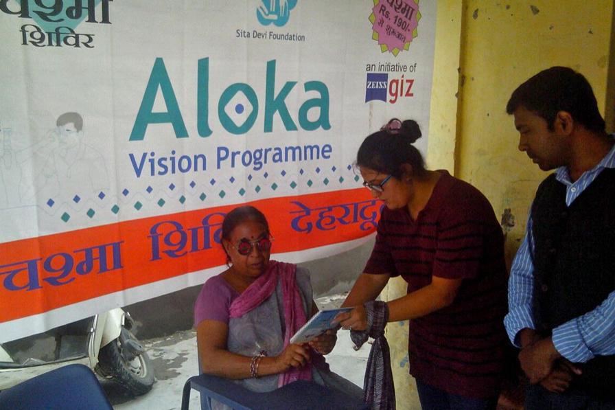 Aloka vision programme woman is testing glasses