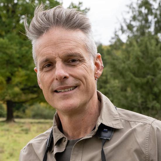 Portrait of Nick Baker. He looks straight into the camera and has a friendly smile