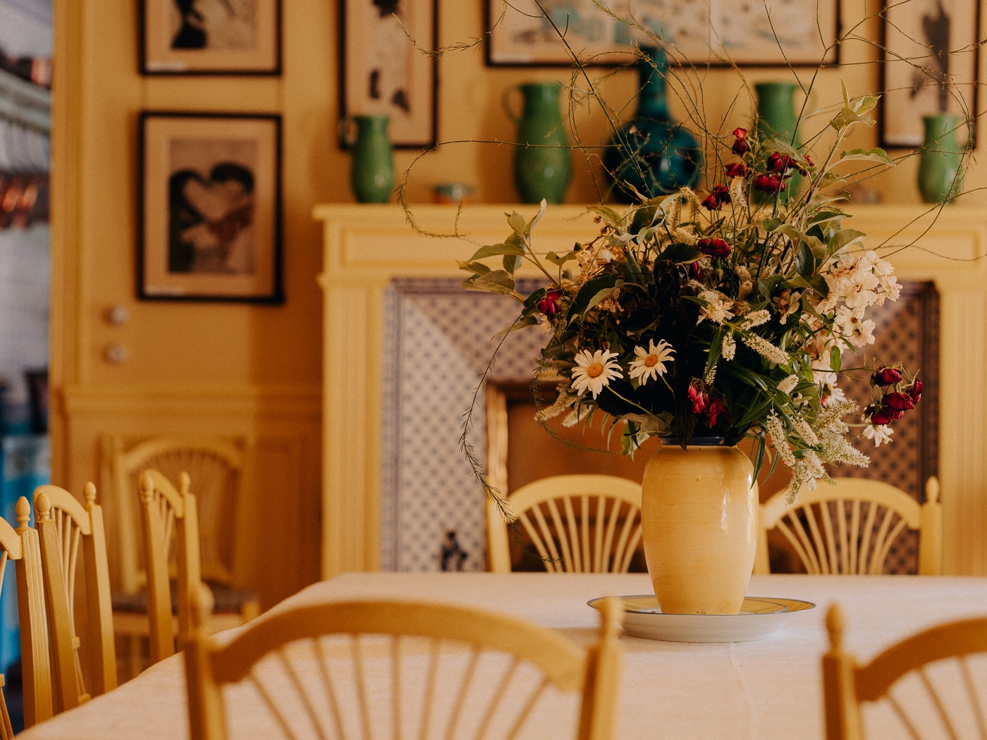 Claude Monet table in chrome yellow room