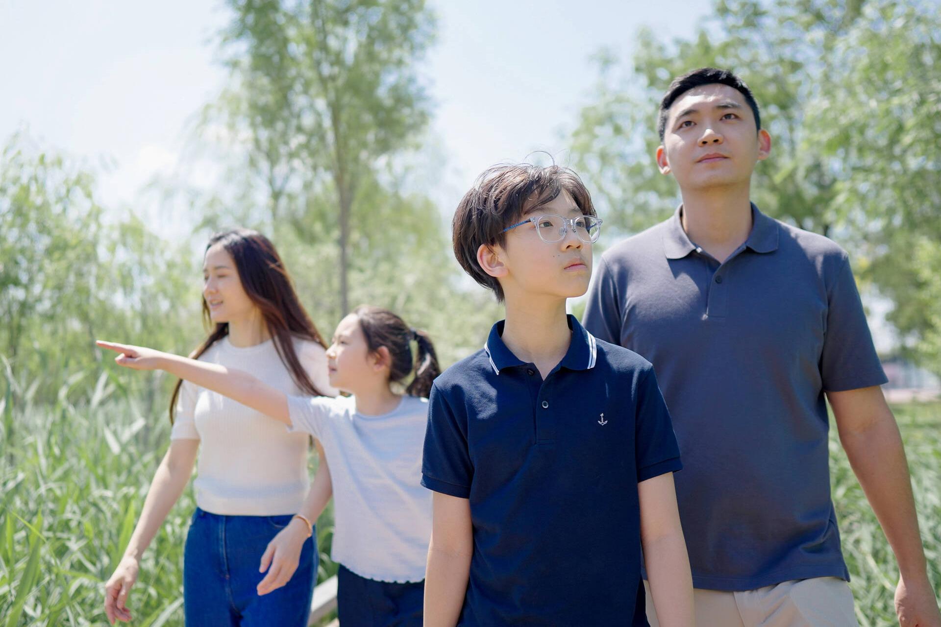 Dandan Li, Aidan, Reese and Peijun Zhong taking a walk in the sunshine