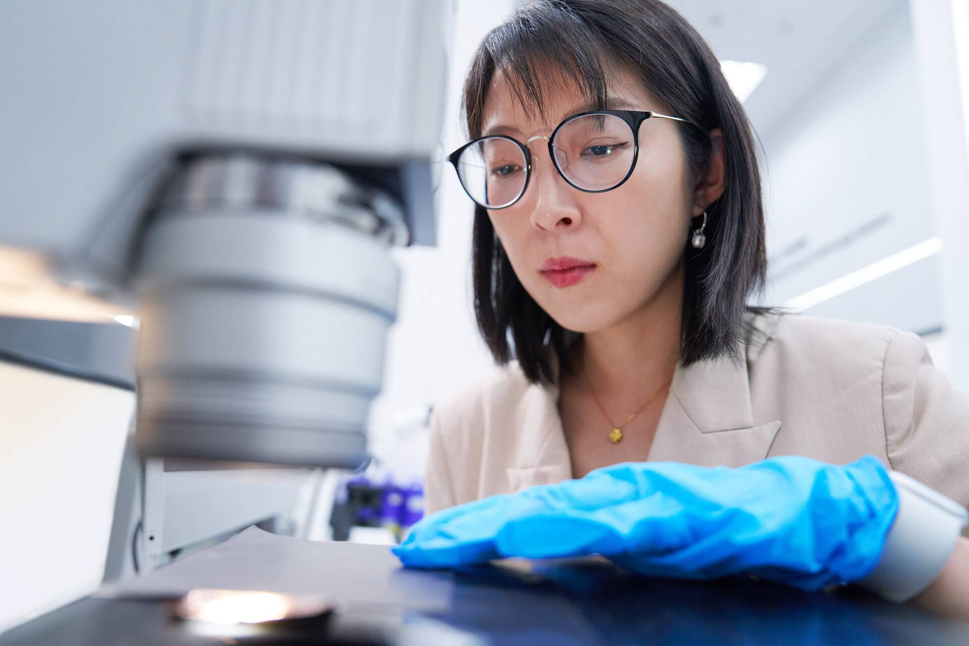 Yuqing Bai working on metrology eqipment in the lab