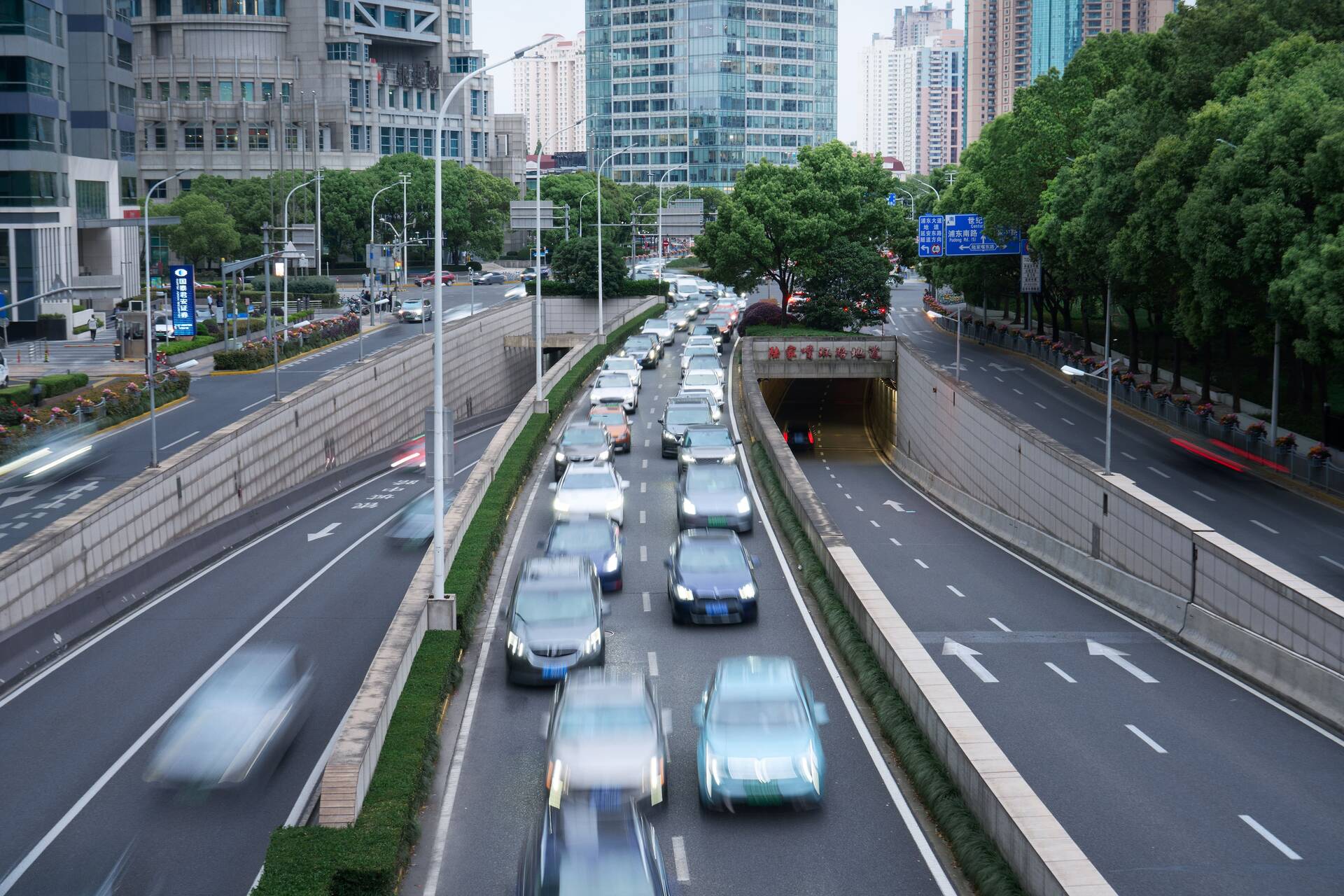 Cars travelling along a road in Shanghai