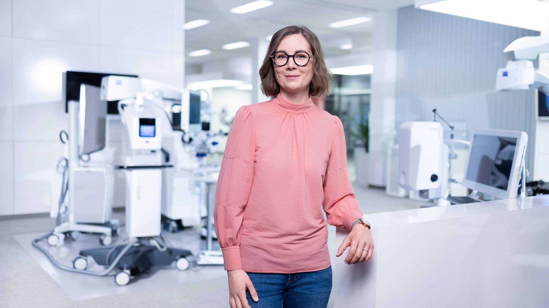 Jennifer standing in a ZEISS Medical Technology building