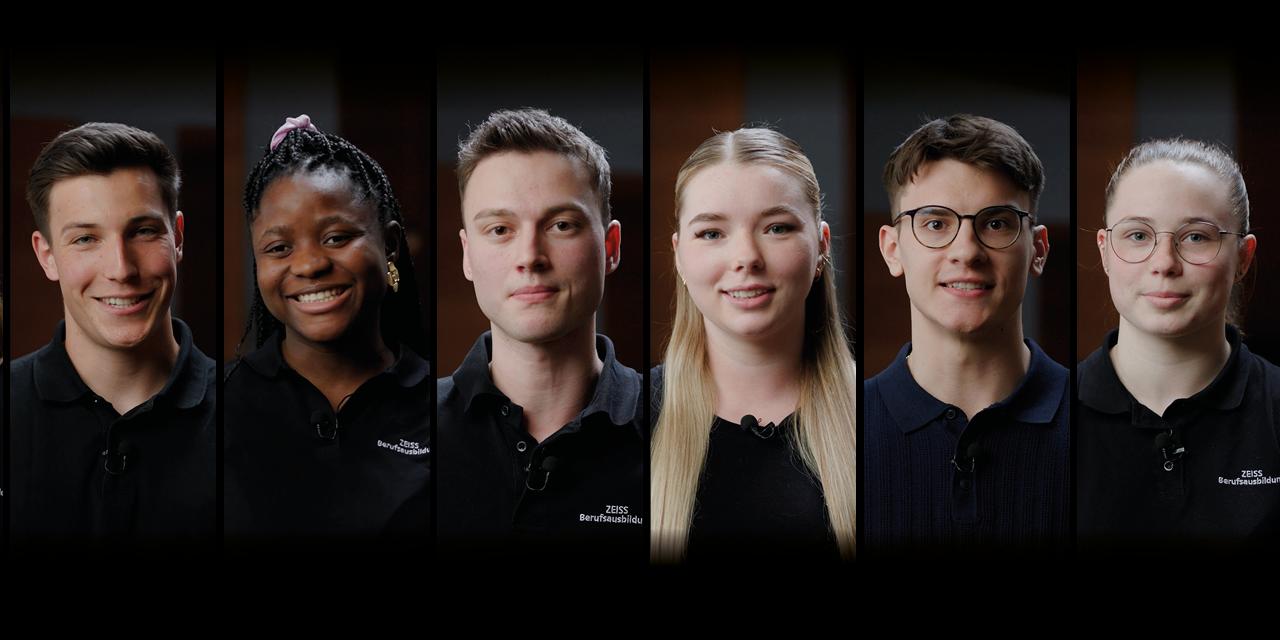 ZEISS Karriere Start Stage Bild mit neun jungen Menschen aus der betrieblichen Ausbildung in dunklen Fimenpoloshirts.