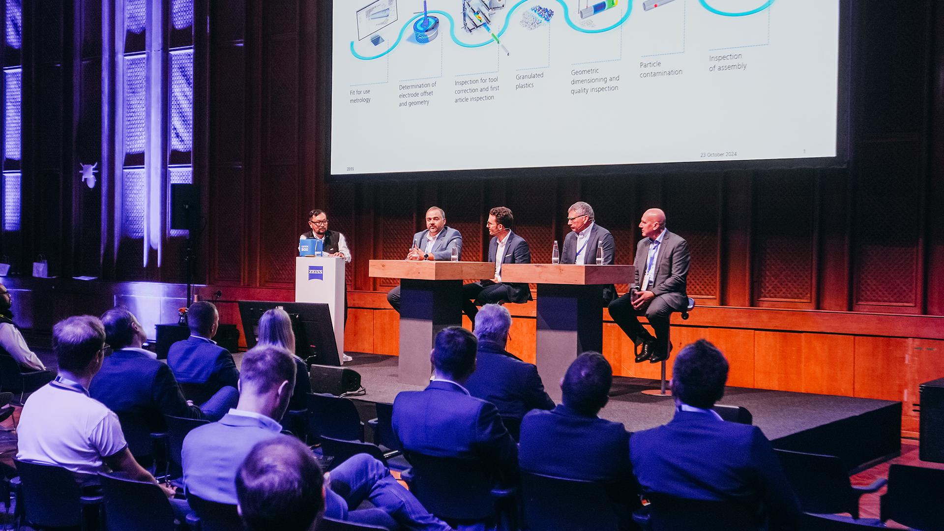 Panel discussion with four speakers at the ZEISS Quality Innovation Summit