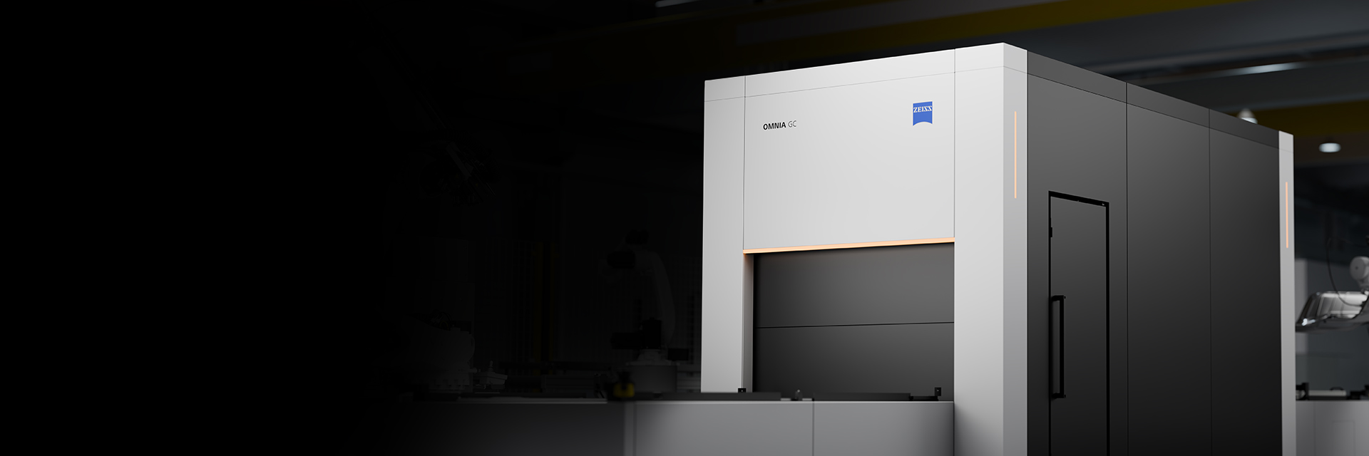 A ZEISS OMNIA GC industrial measuring system is positioned in a high-tech factory environment.