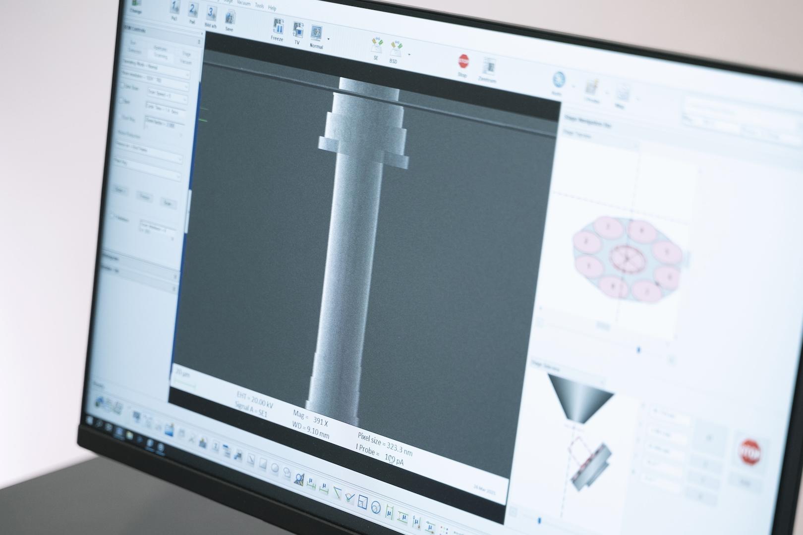Computer monitor displaying a ZEISS imaging software interface with a detailed close-up view of a cylindrical object under analysis.
