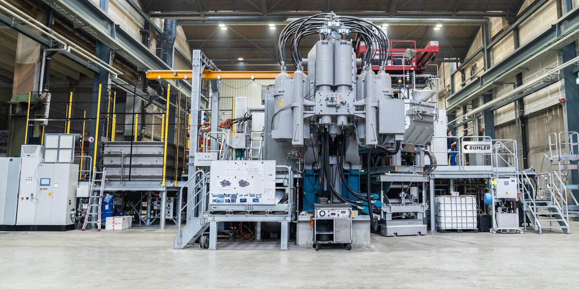 Industrial machinery in spacious factory setting.