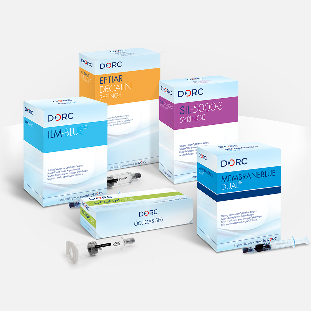 Several boxes and syringes of DORC ophthalmic surgical products are displayed against a light background.