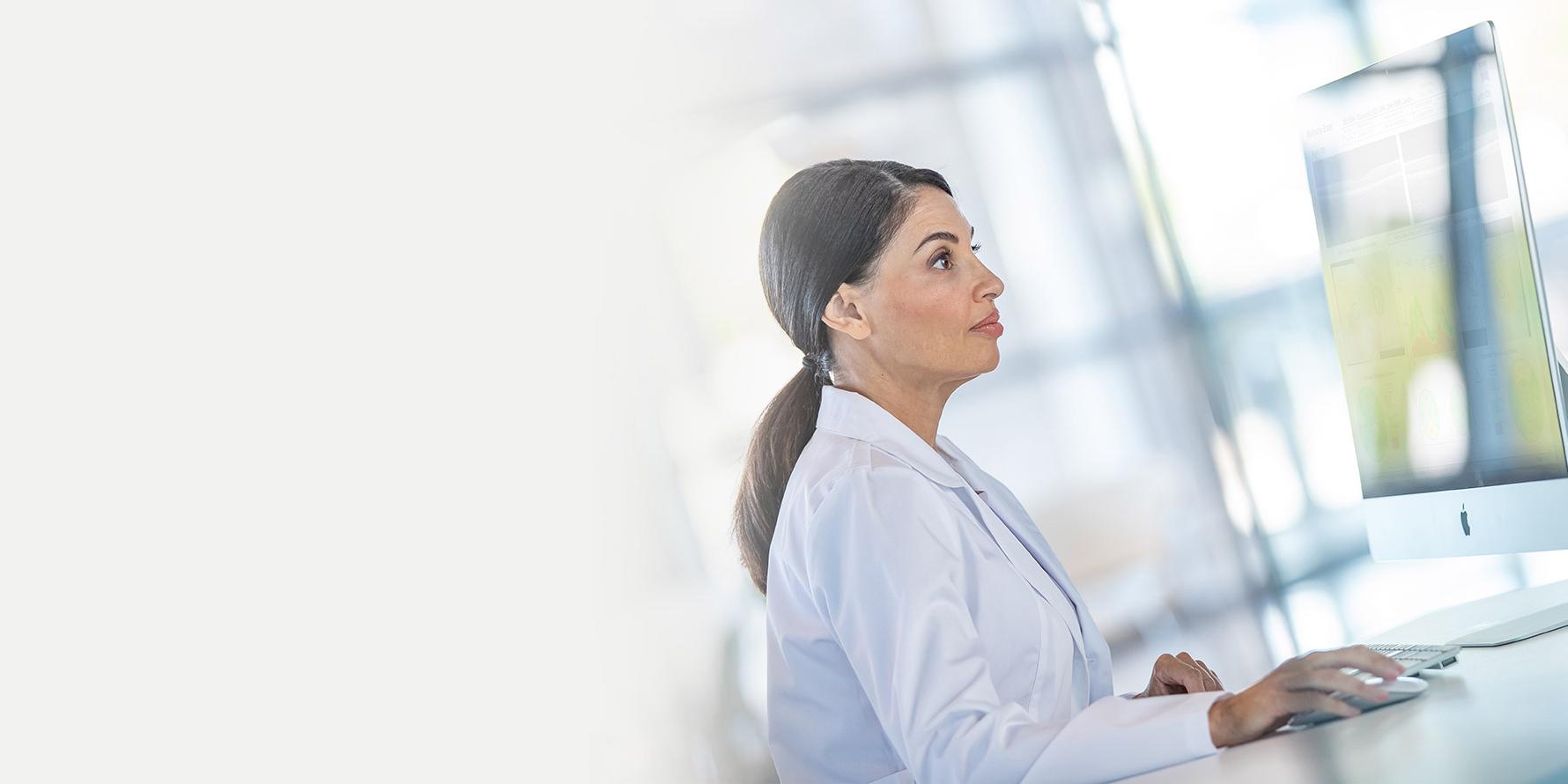 Image of a doctor with a computer