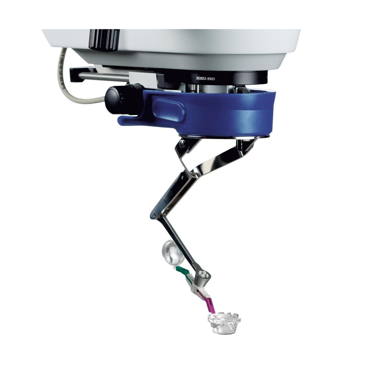 Single-use Lenses for ZEISS RESIGHT with articulated arm holding a fine surgical instrument over a small medical object.