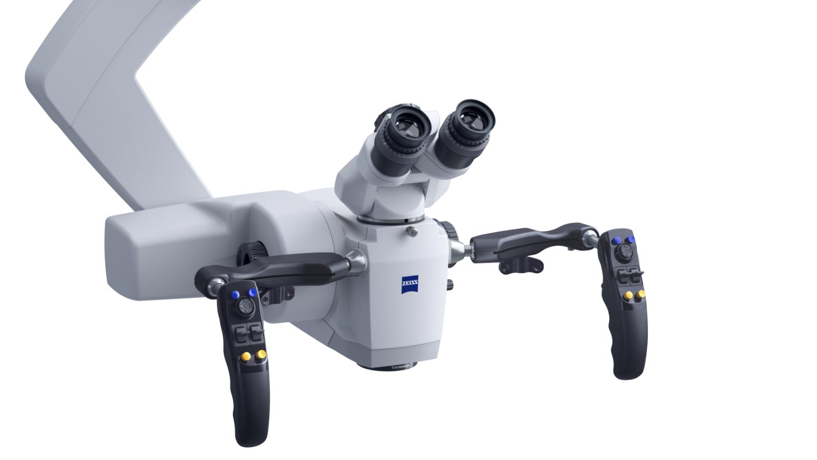 High-tech ZEISS surgical microscope with dual eyepieces, control handles, and an articulated arm.