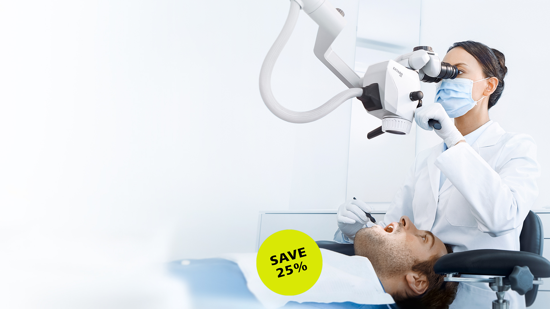 A dentist uses a ZEISS dental microscope while examining a patient in a modern clinical setting.