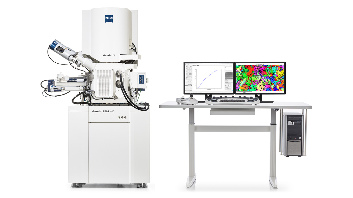 The in situ lab integrated into the SEM chamber and table with PC, monitors for SEM GUI and analytical software (e.g. EBSD), keyboard and joystick.