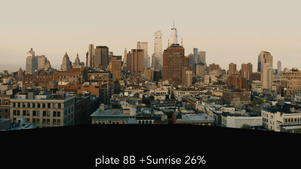 Two people are working with professional film production equipment, including a camera and monitor, in a studio setting featuring ZEISS lenses.