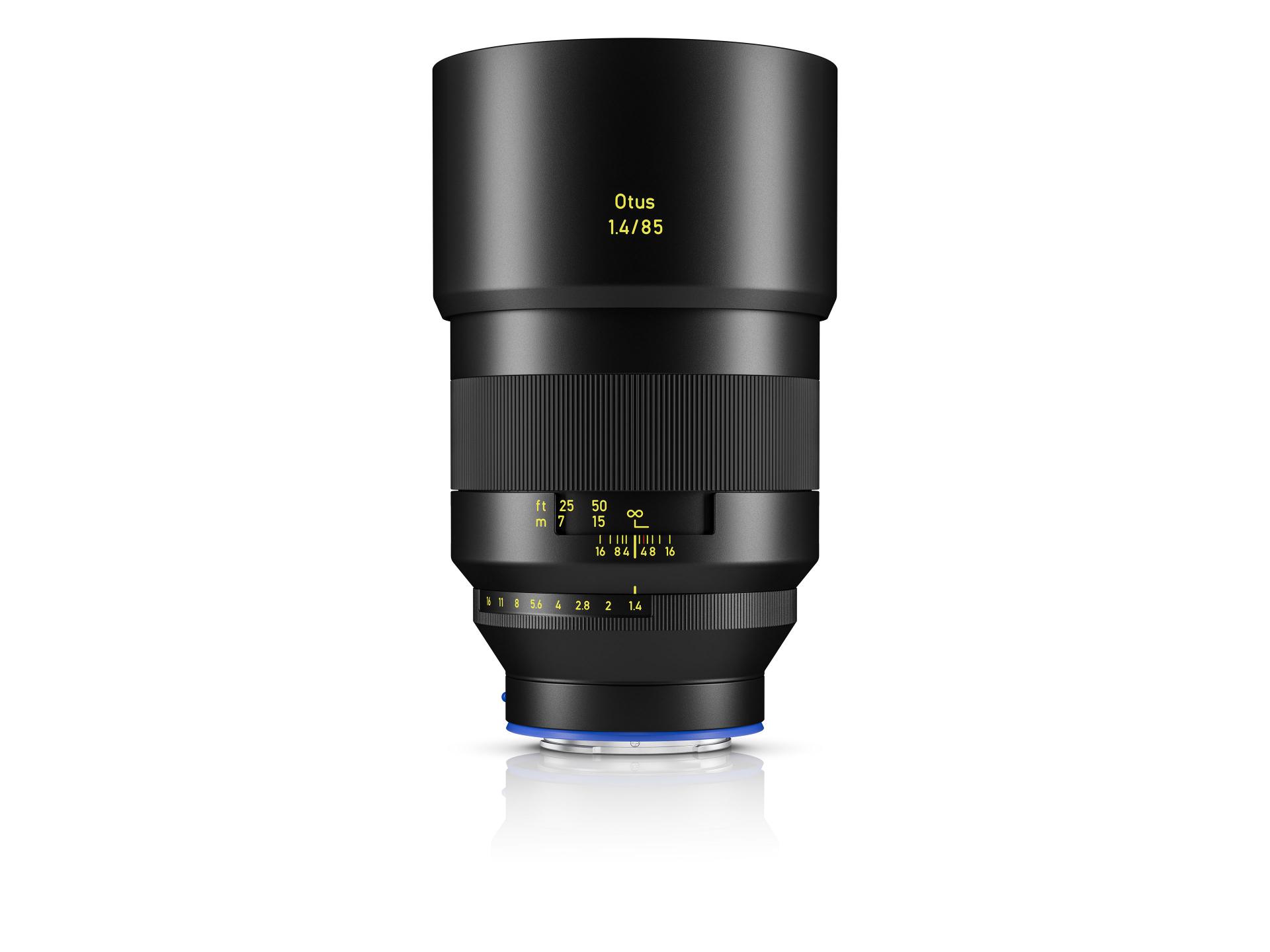 High-quality ZEISS camera lens with visible focus and aperture markings, featuring a sleek black design and the ZEISS logo.