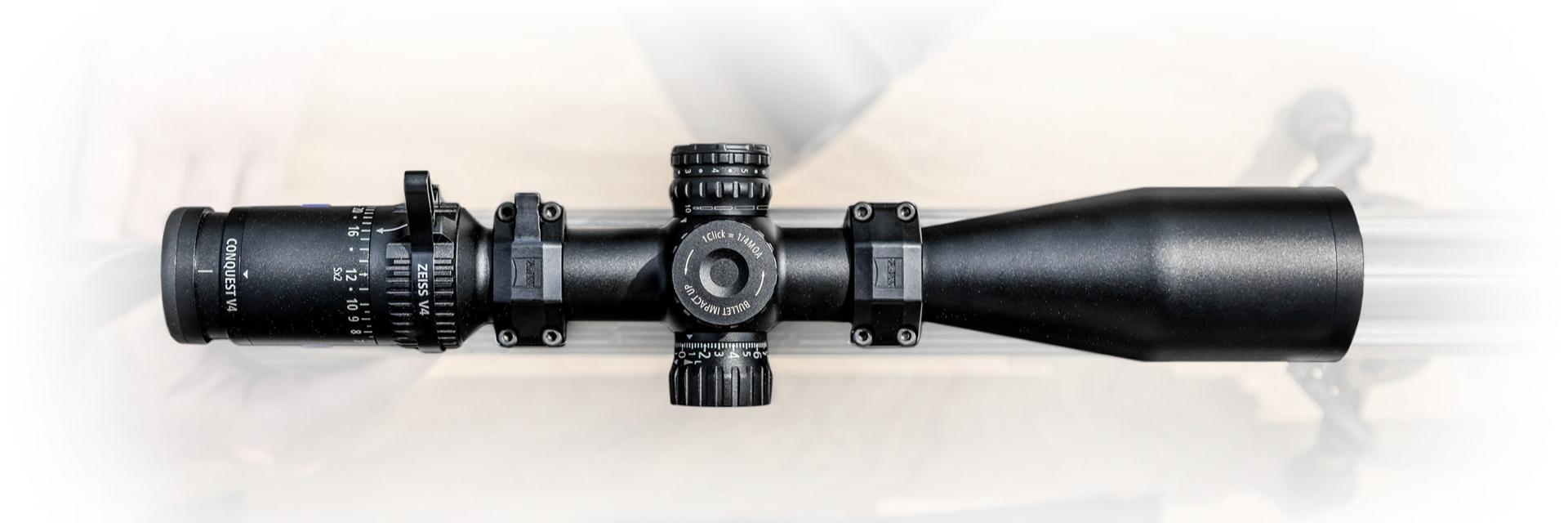 Top view of a mounted ZEISS riflescope with precision adjustment dials and a matte black finish.