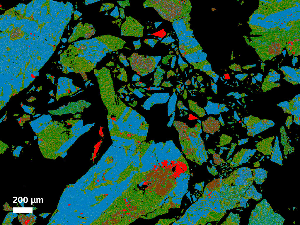 Particules résiduelles de laitier de cuivre provenant d'une grande fonderie de cuivre en Zambie. Échantillon reproduit avec l'aimable autorisation de Petrolab, R.U.