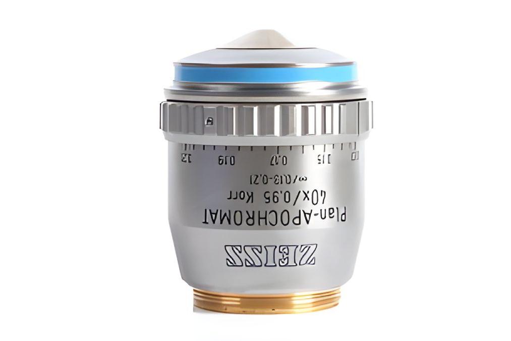 Photo of a microscope objective with upside down labeling indicating it is a corrected ZEISS 40x Plan-Apochromat with a numerical aperture of 0.95.