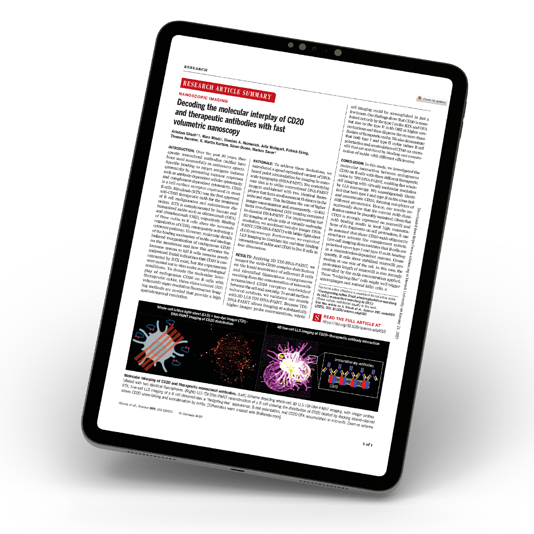 A tablet displaying a scientific research article summary with text, diagrams, and graphs on the screen.