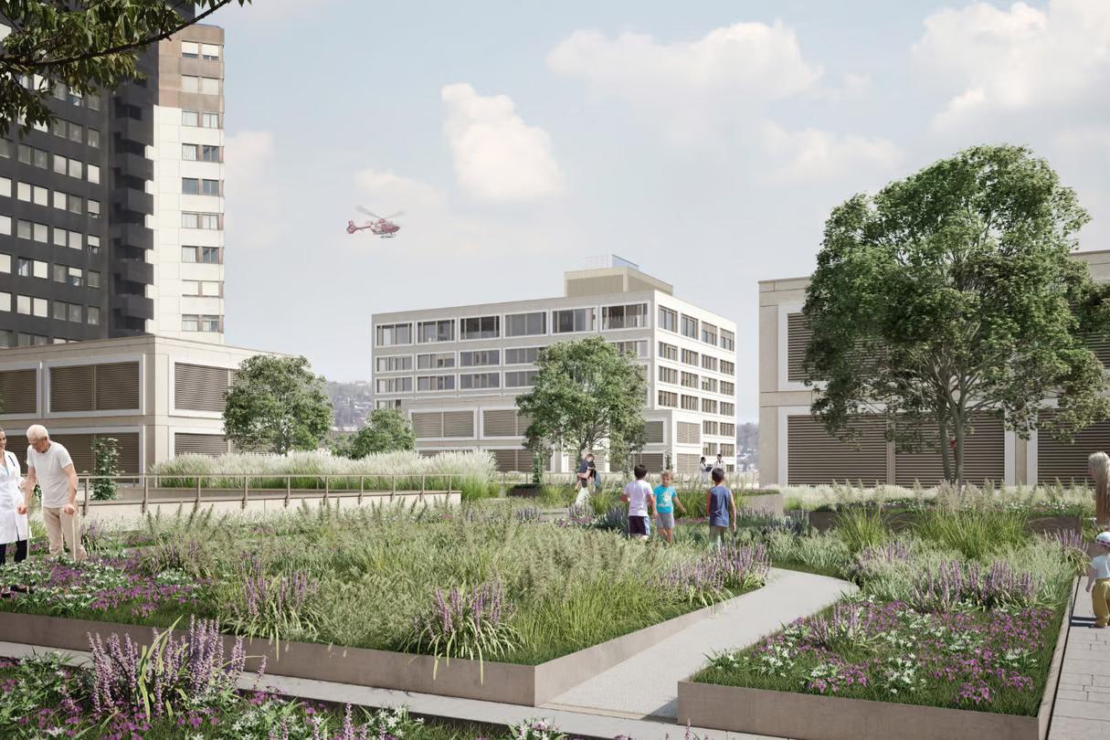 A landscaped urban garden with pathways, surrounded by modern buildings. People are walking and interacting. A helicopter is visible in the sky.