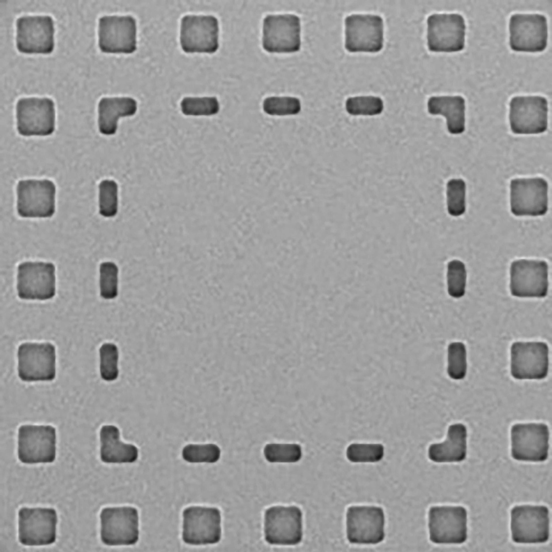 A photomask with structures and defects