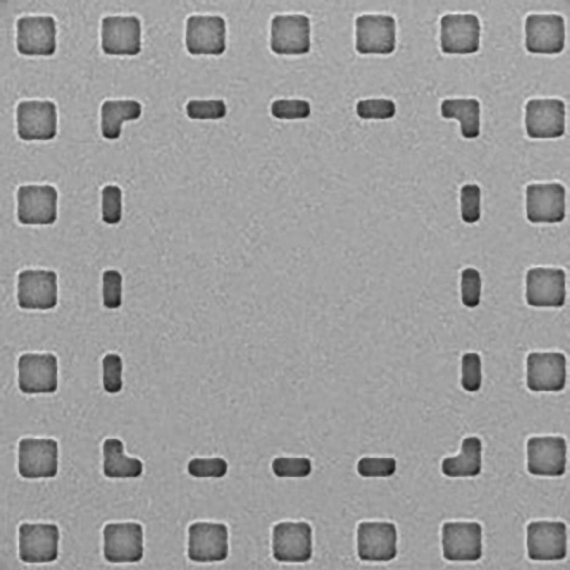 A photomask with structures and defects