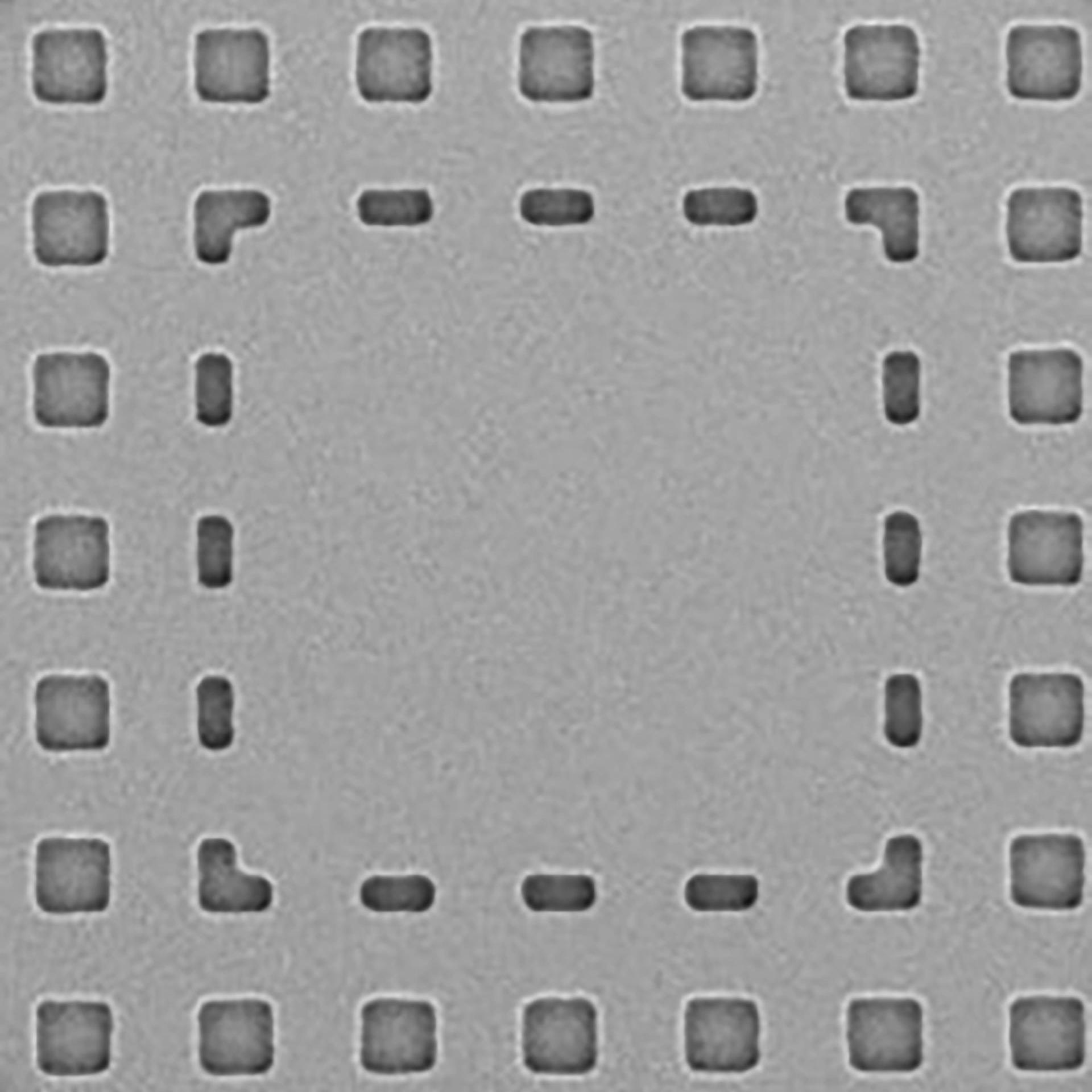 A photomask with structures and defects