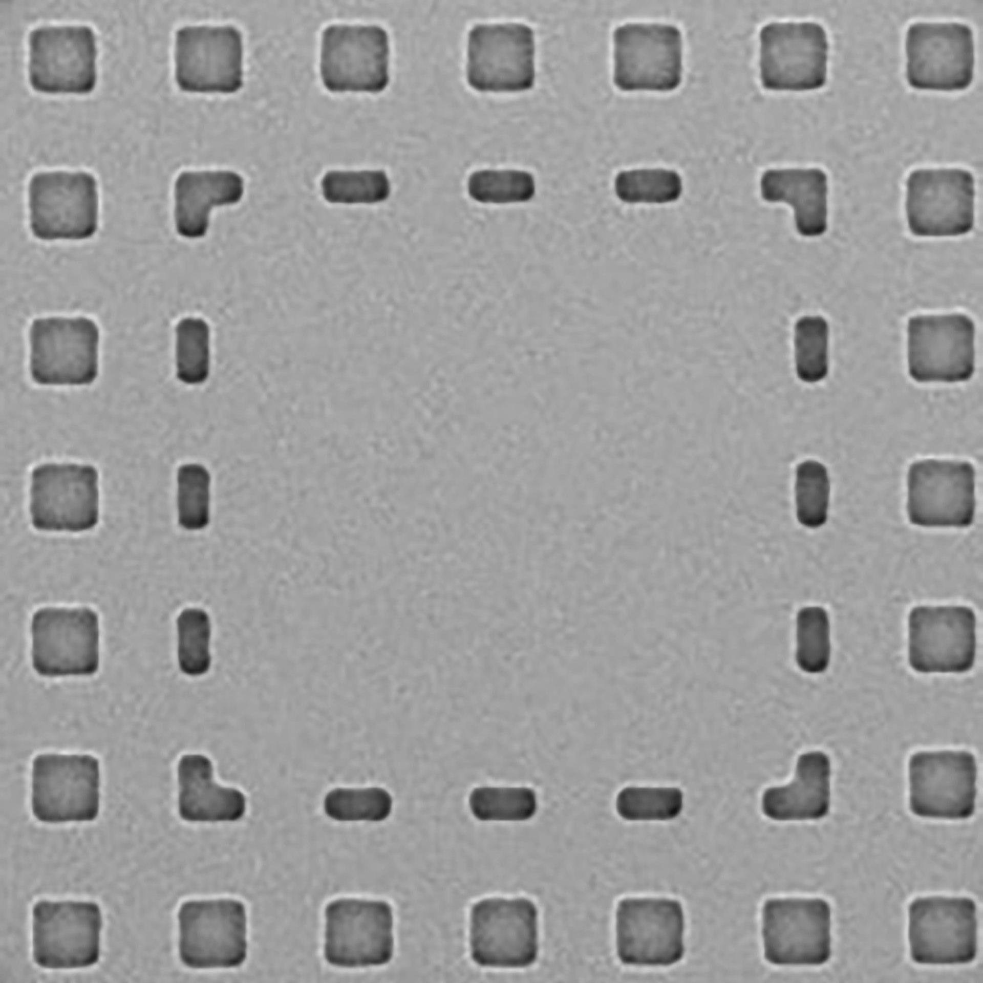 A photomask with structures and defects