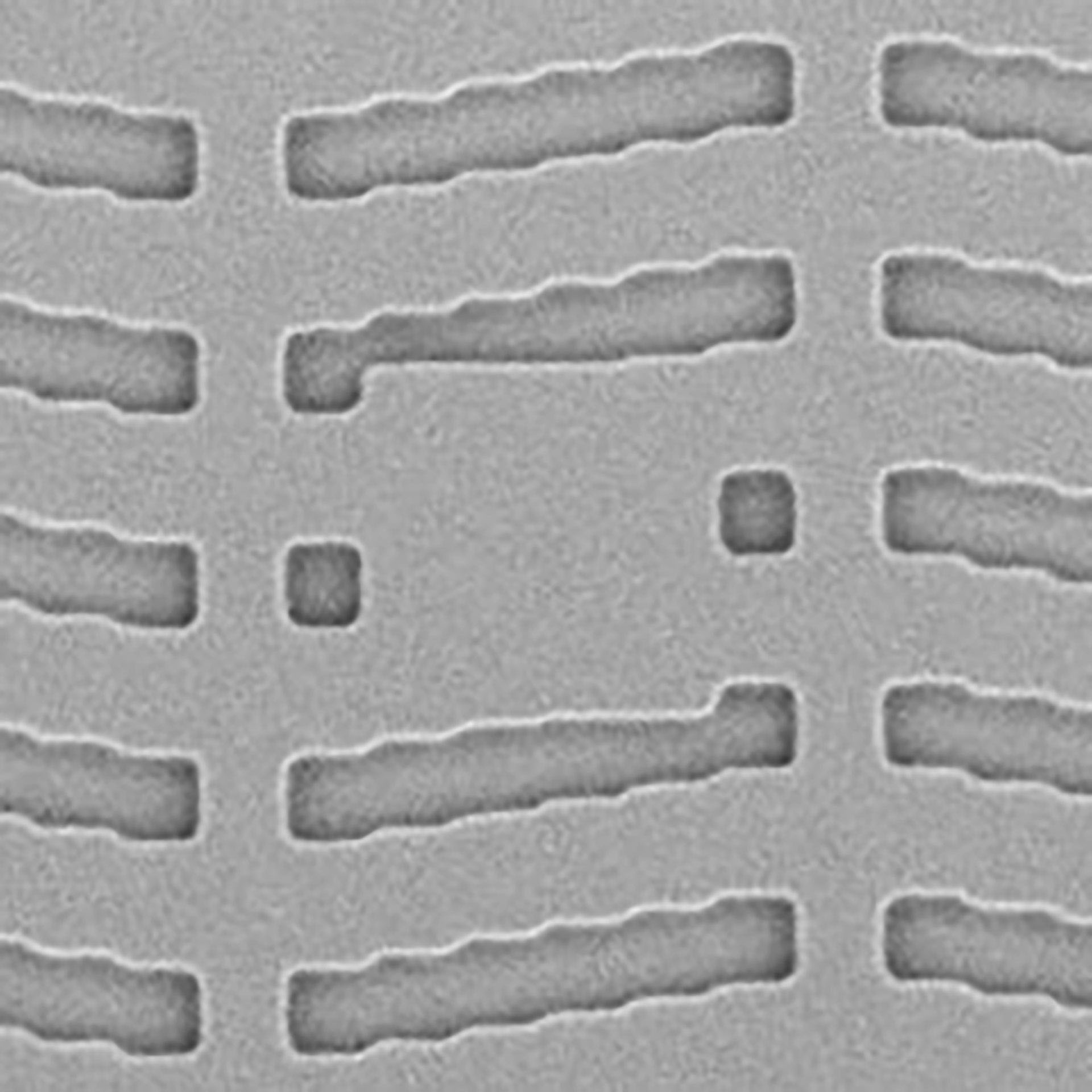 A photomask with structures and defects