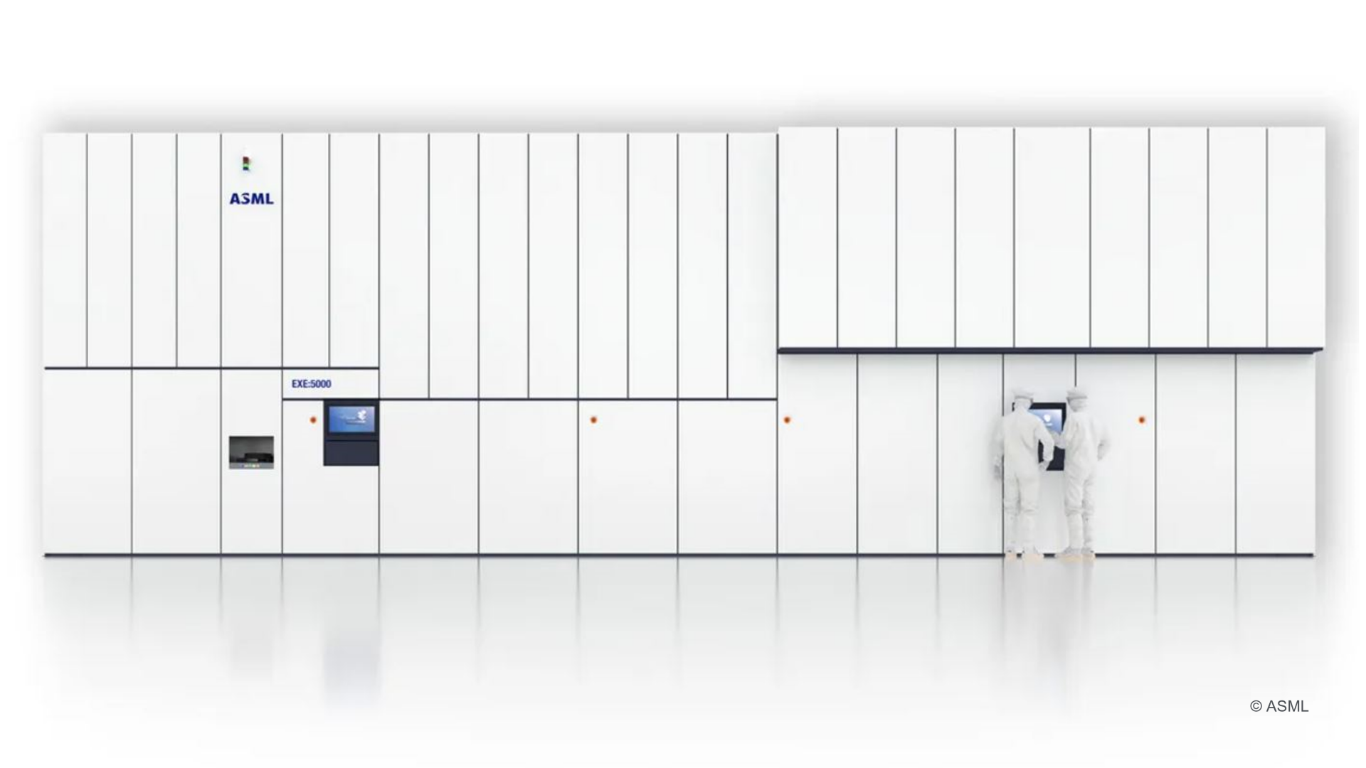 ASML's machine for manufacturing state-of-the-art microchips with two employees at the control panel