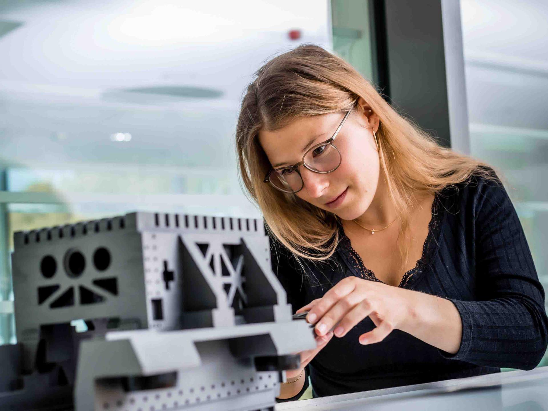 An associate works on important technologies for the semiconductor industry