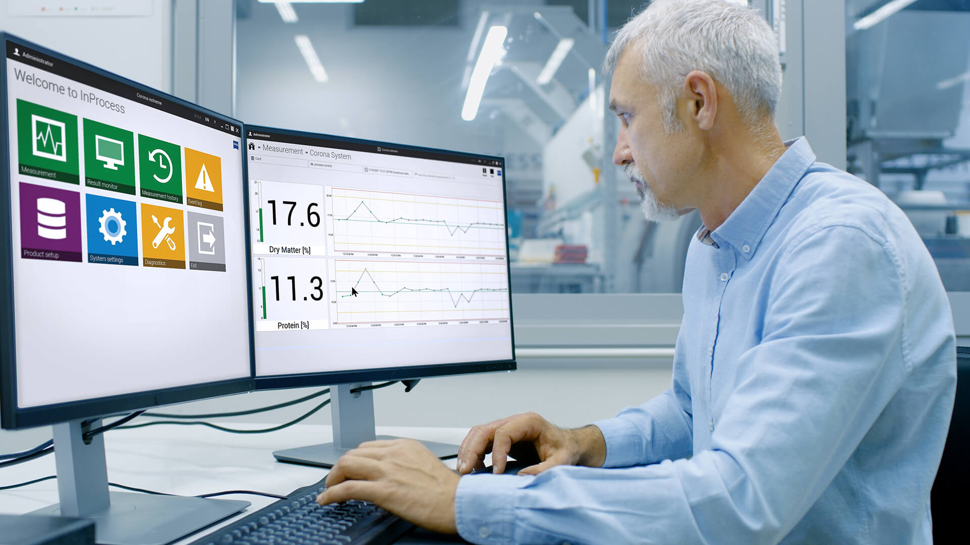 engineer sits in front of the computer in a production environment in his office, the screens show the interface of the inprocess software 