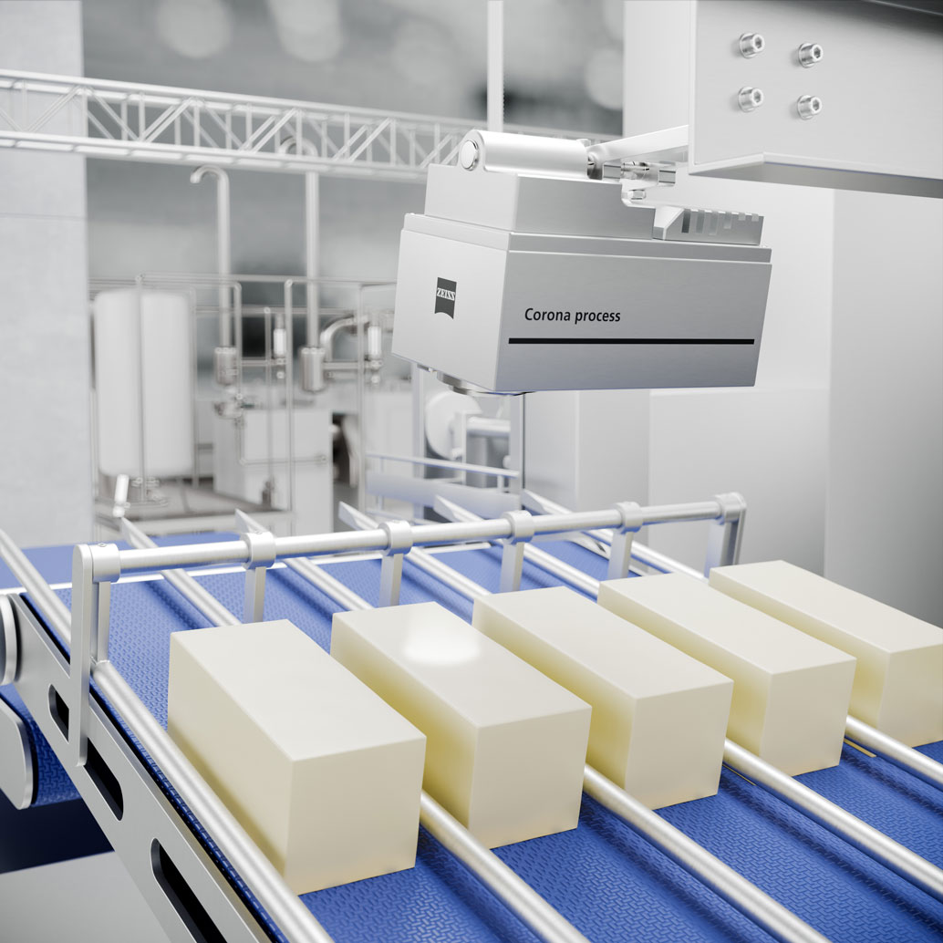 Corona® process over conveyor belt at cheese factory