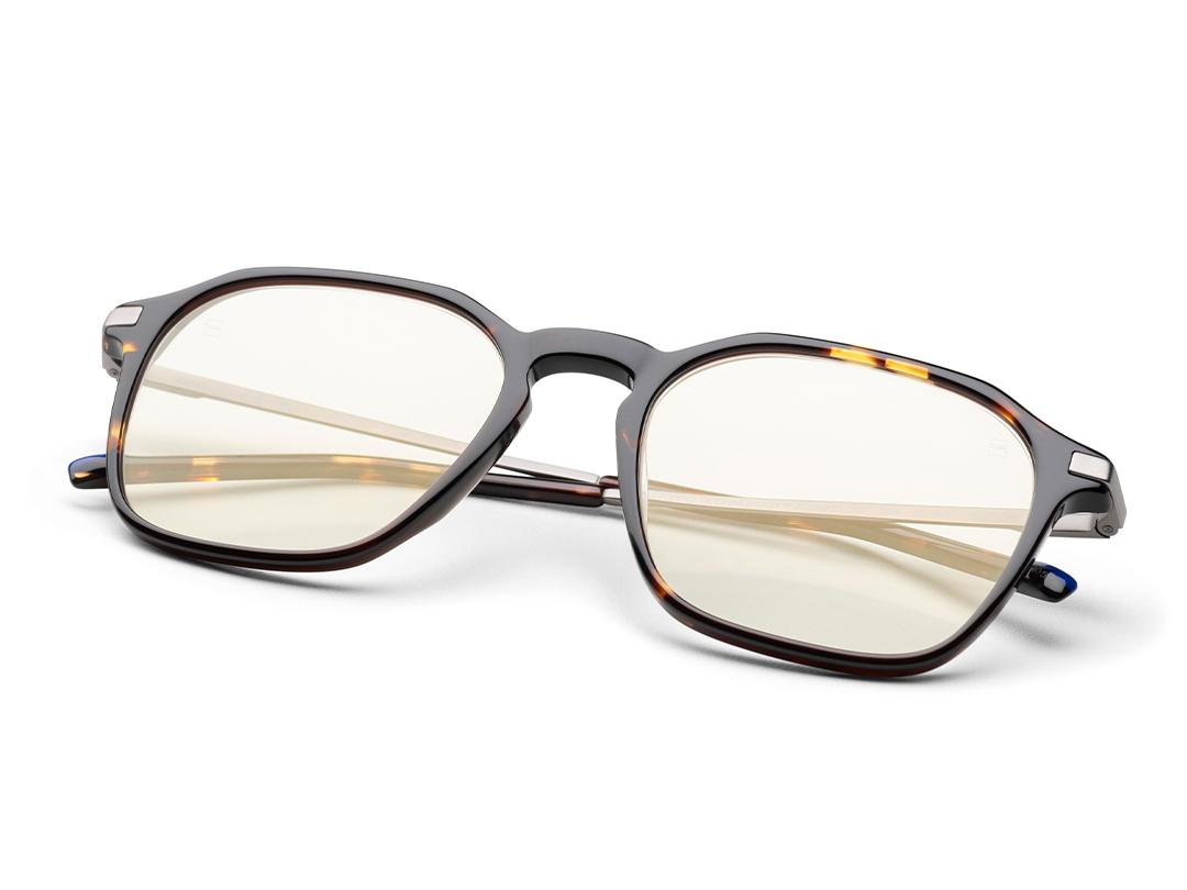 Clear eyeglasses in a brown frame with ZEISS DuraVision Gold UV anti-reflective eyeglass coating.