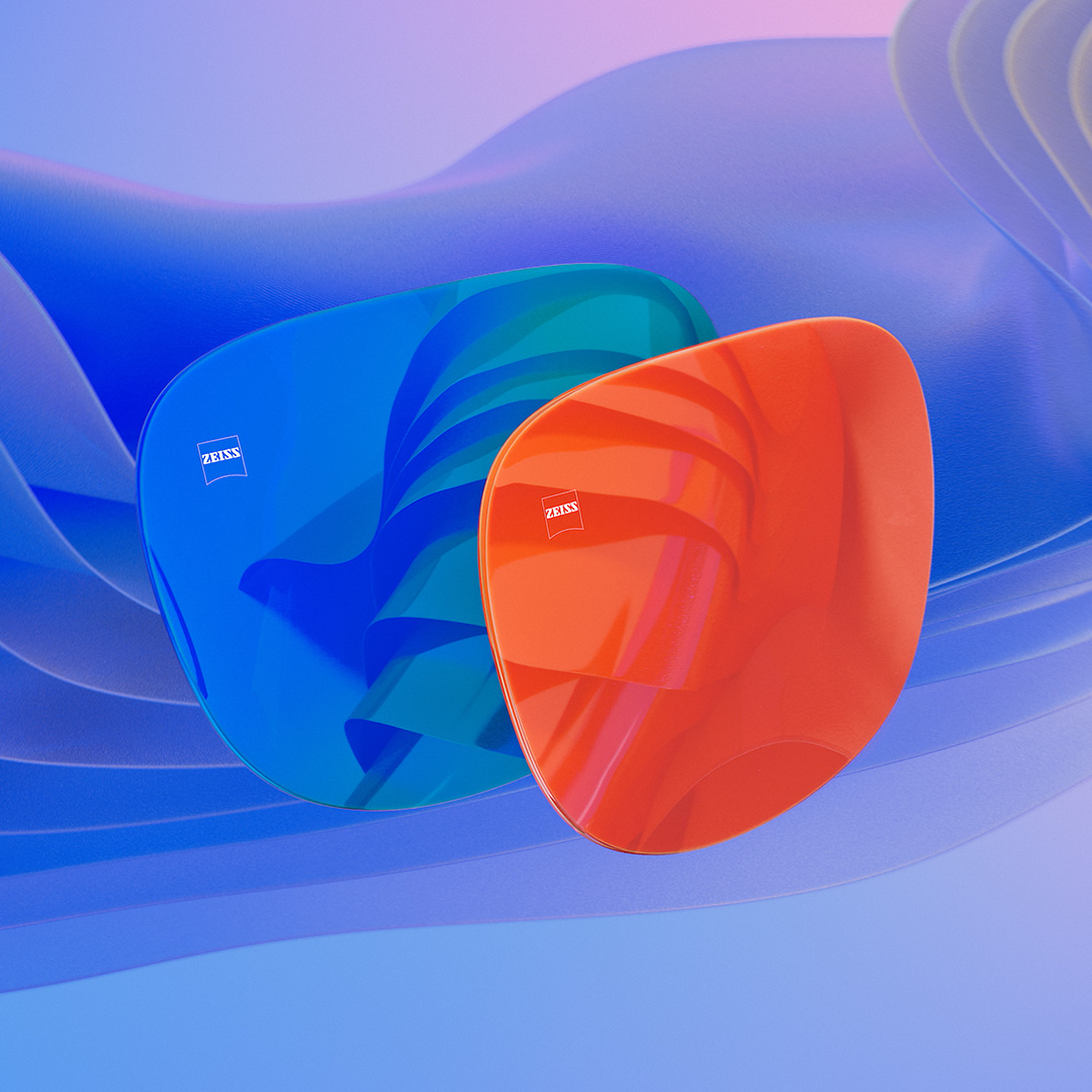 3D CGI illustration of two sunglass lenses with a blue and an orange mirror coating.