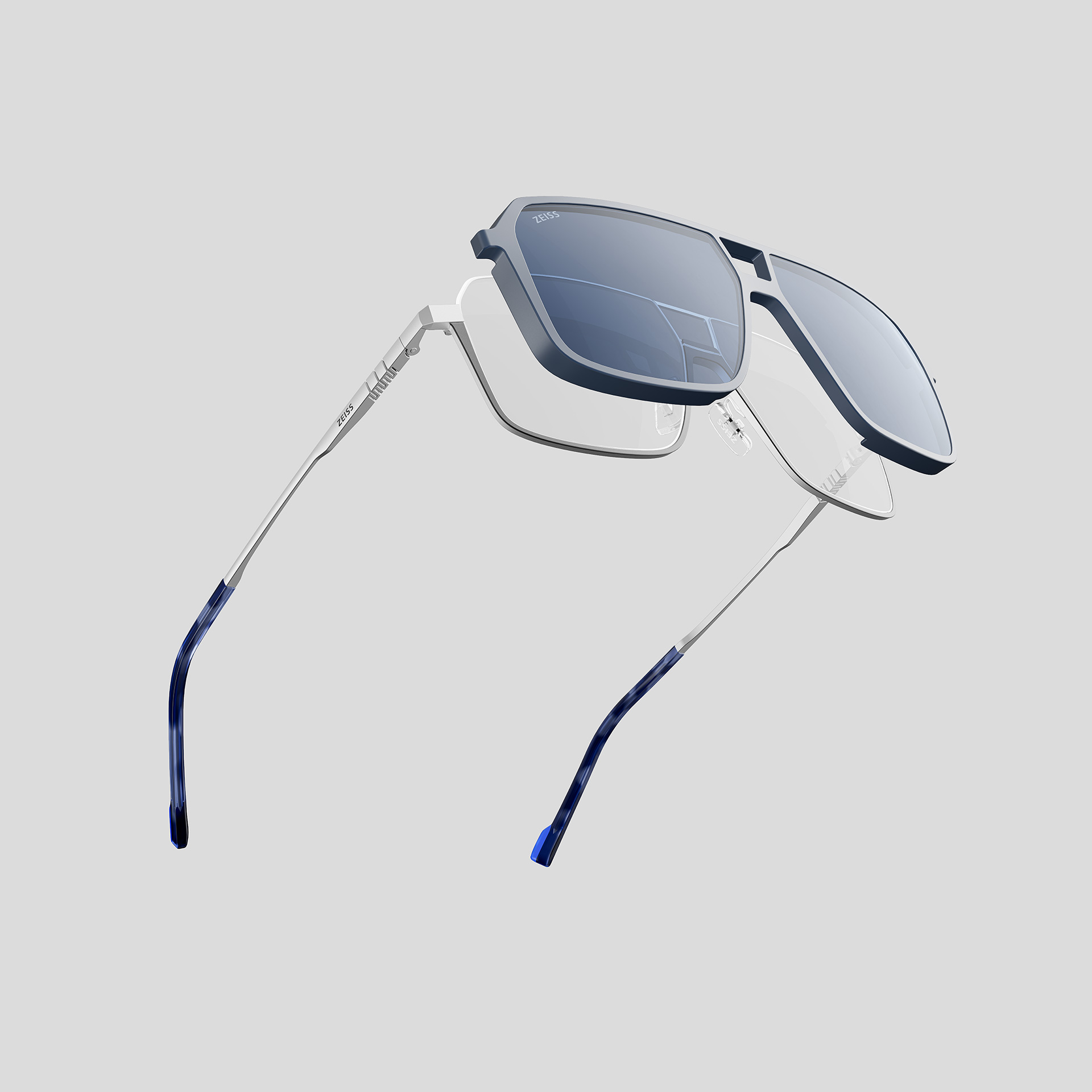 A ZEISS frame with a magnetic clip for darker glasses.