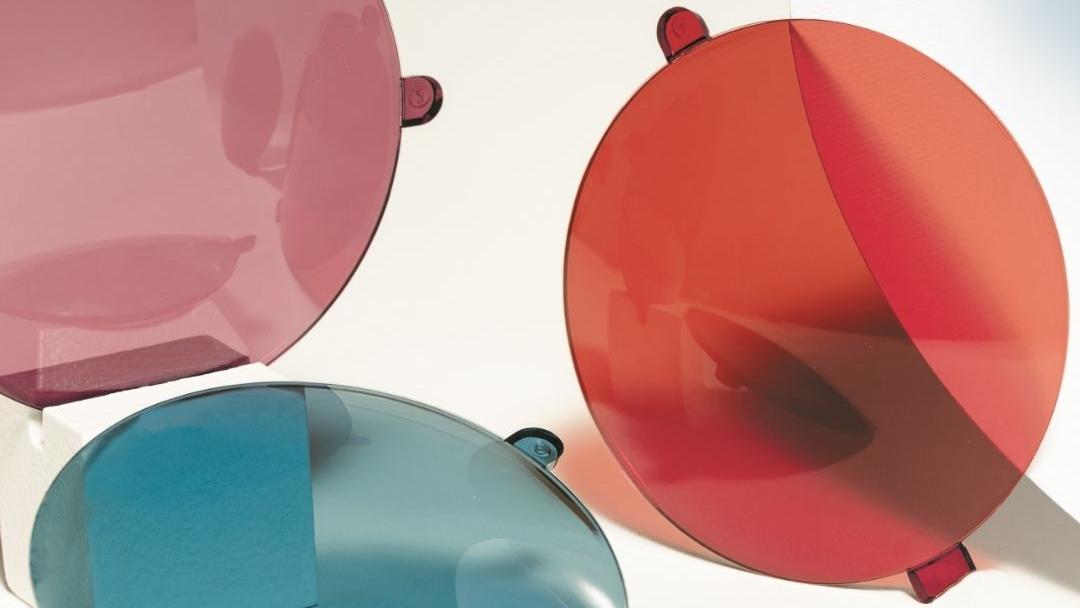 Image showing three coloured sunglass lenses (pink, red, blue)