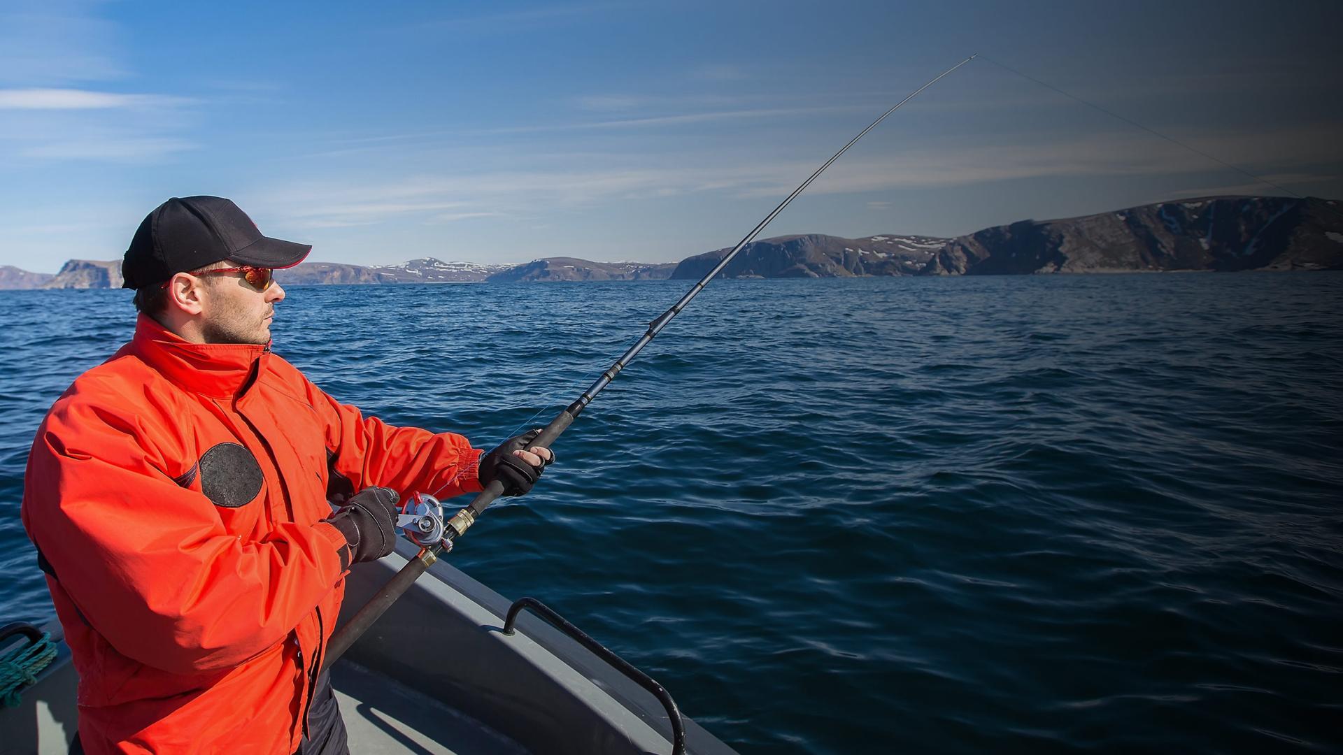 Image of a fisherman on a boat.