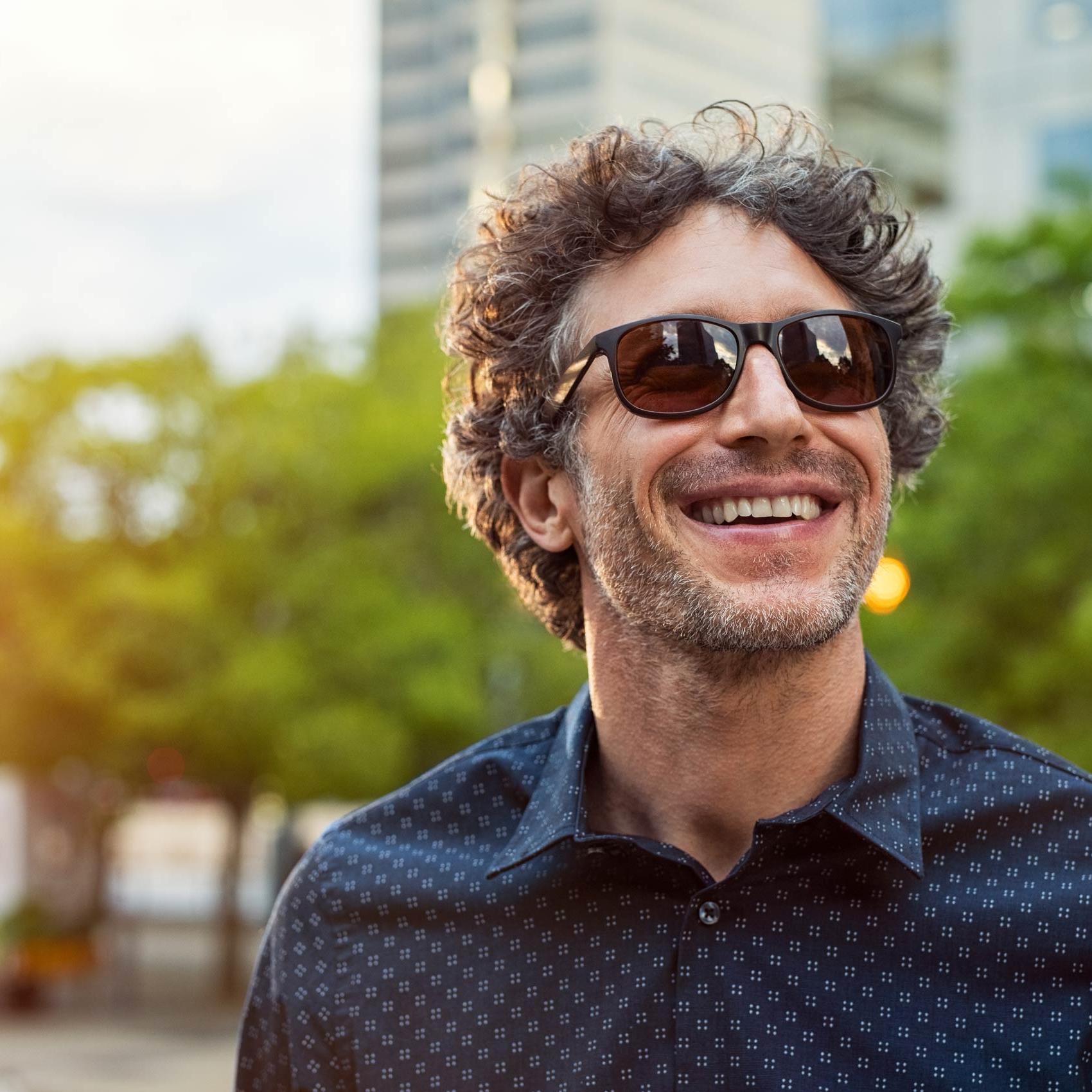 Image of a man wearing lifestyle sunglasses.