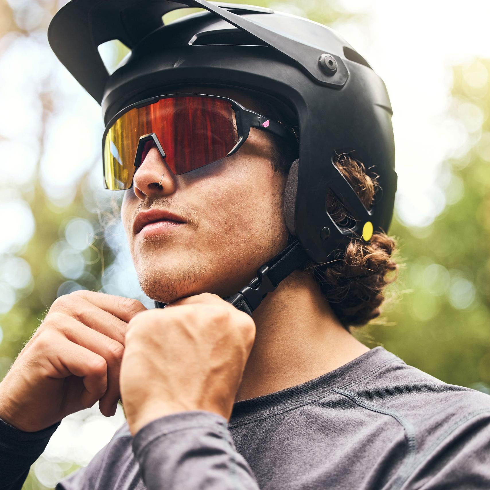 Image of a man wearing sport sunglasses.