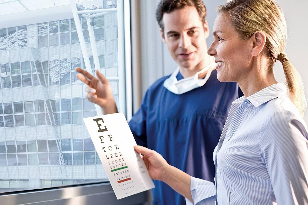 Patient during the Visual Acuity Test with an eye chart.