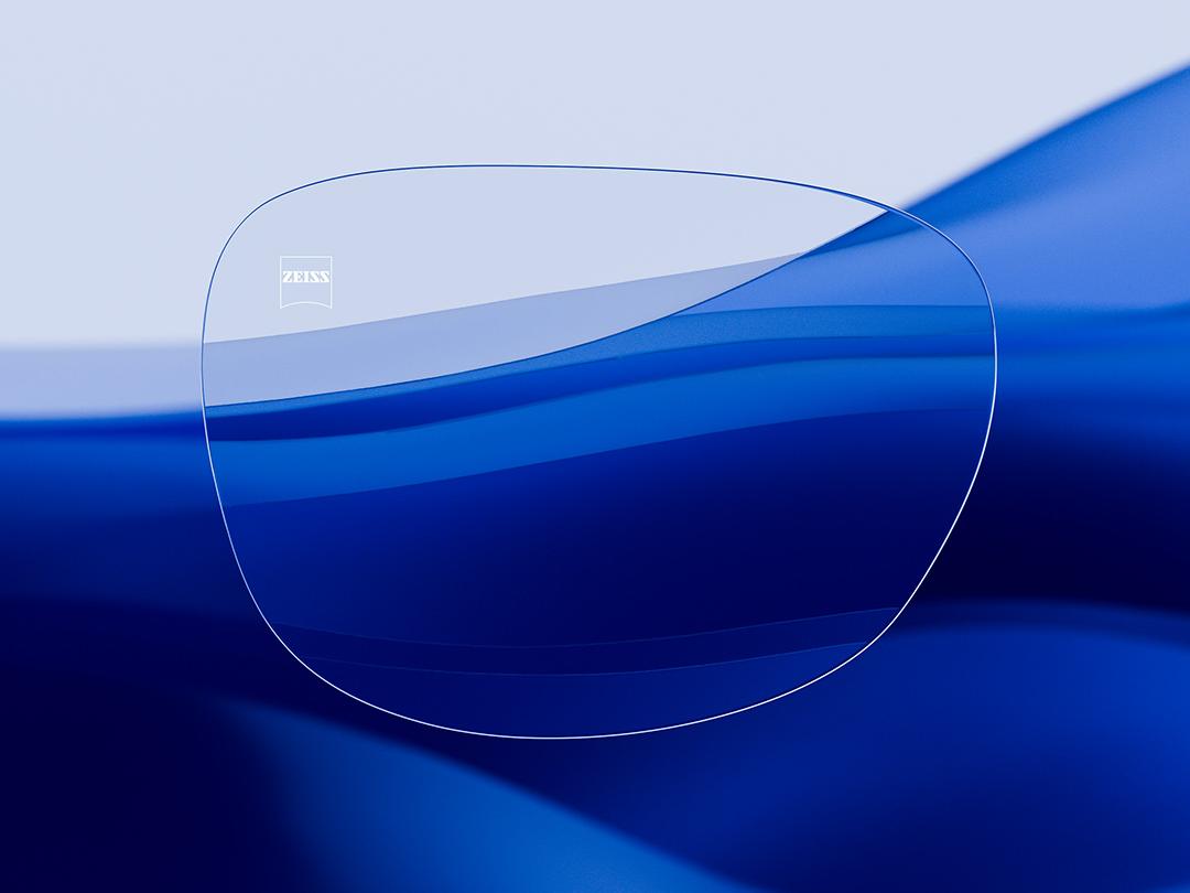 Split image showcasing a ZEISS lens on one half, characterized by its clarity and cleanliness, while the other half displays a strongly reflective conventional eyeglass lens, highlighting the contrast in optical quality.