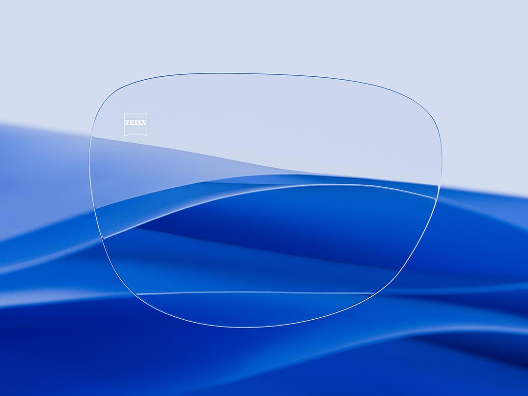 Split image showcasing a ZEISS lens on one half, characterized by its clarity and cleanliness, while the other half displays a scratched conventional eyeglass lens, highlighting the contrast in durability. 