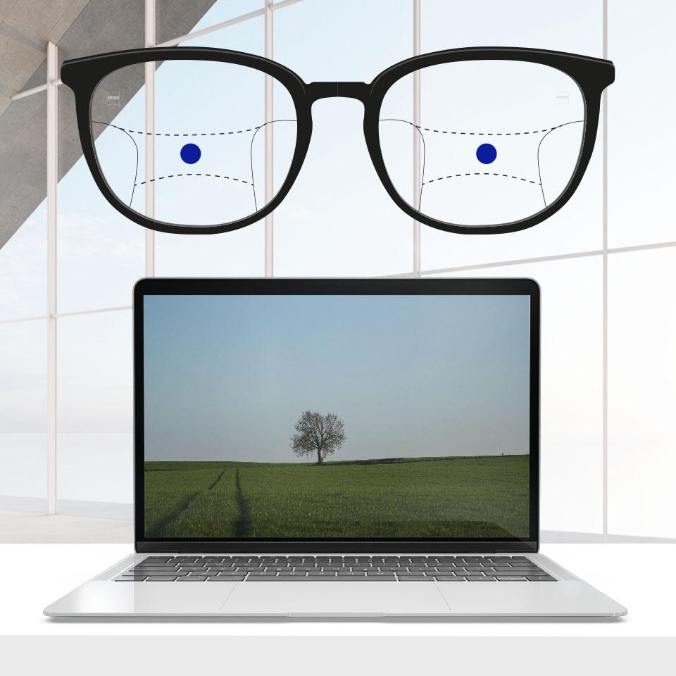 A frame with progressive lenses and schematic lines to indicate different viewing zones. Different parts of the lens are highlighted: Intermediate—middle of the glasses.